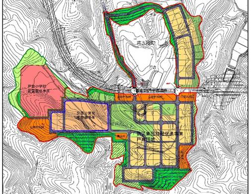 土地の用途が色分けされ、住宅や学校の区画が示されている平面図