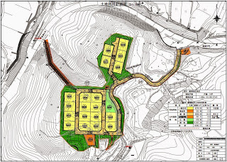 地図上に等高線とともに住宅地の計画区域が色分けされ、区画番号や面積が記載された土地利用計画図