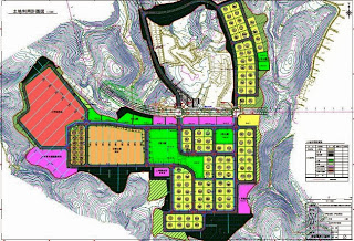 色分けされた複数の区域と等高線が描かれ、右下に凡例が記載された地形や用途の違いを示す詳細な地図