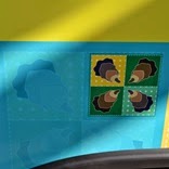 黄色と緑の背景に、牡蠣のイラストが四つの区画に分かれて描かれたデザインをアップで写した写真