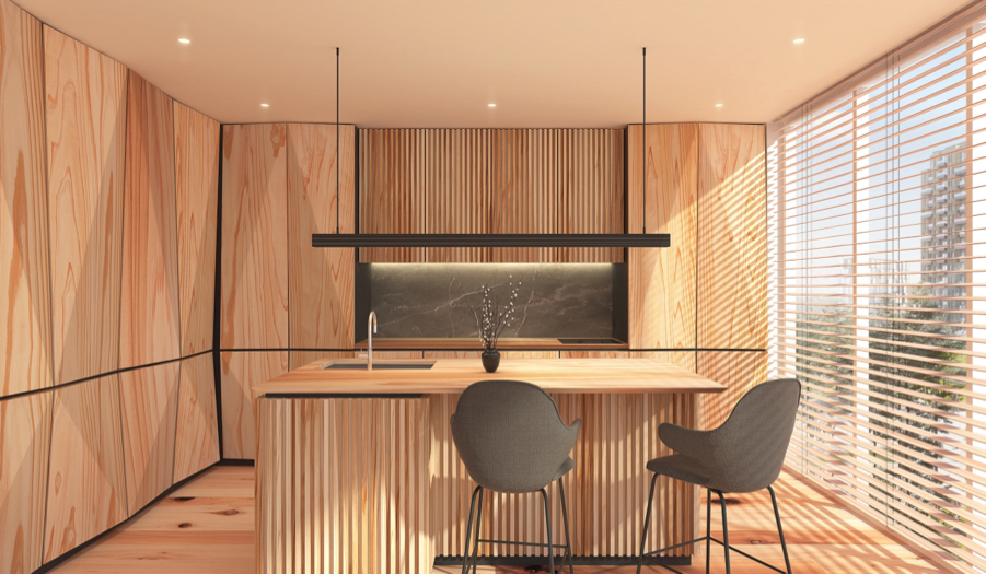 大きな窓から光が差し込む木目調の明るいキッチンに、アイランドカウンターと2脚椅子が置かれた写真