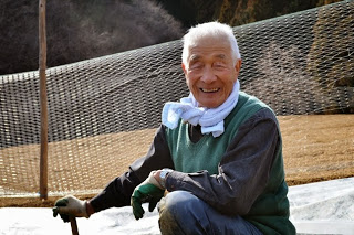 笑顔の小野寺功さんの写真